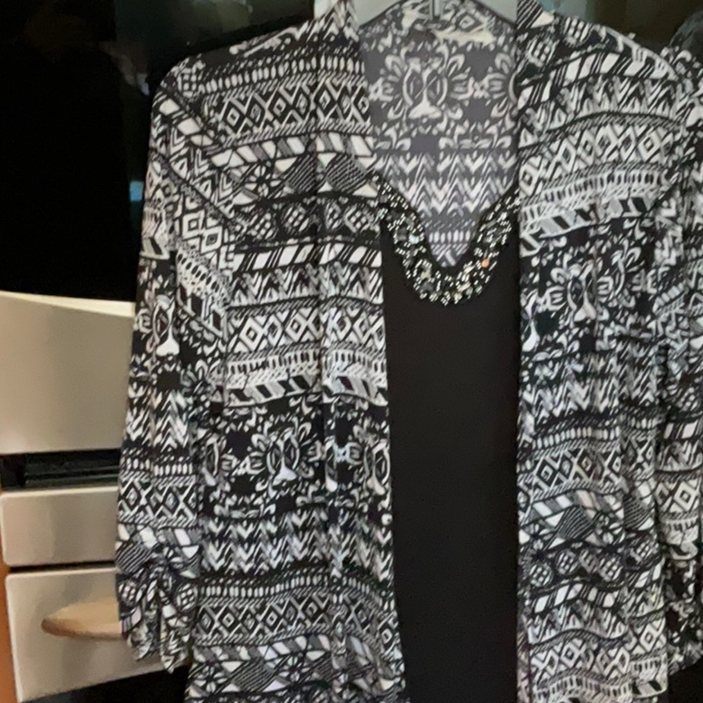 Fancy Ladies Black & White Top with Rhinestones. One piece with over blouse.